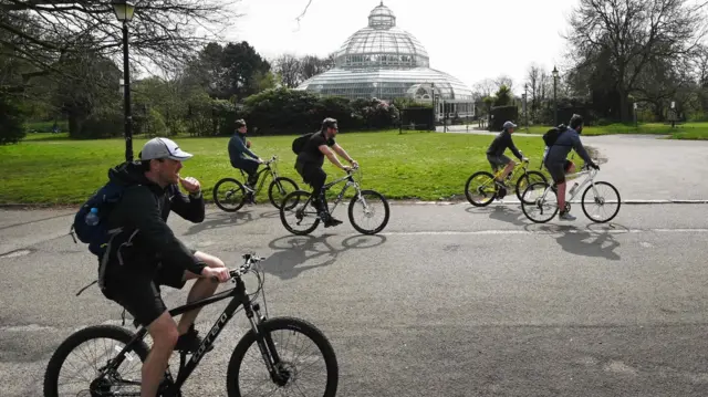 Cyclists in a park in Liverpool