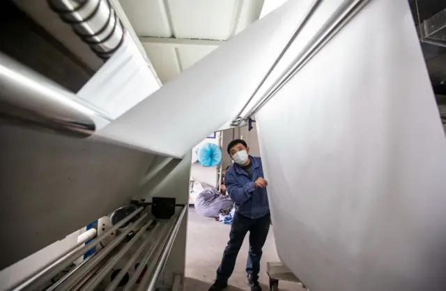 A textile worker at a factory in Haiyan City, China