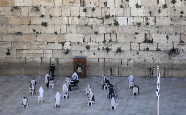 Jewish priests take part in the Cohanim prayer (priest's blessing), during Passover at the Western Wall in Jerusalem