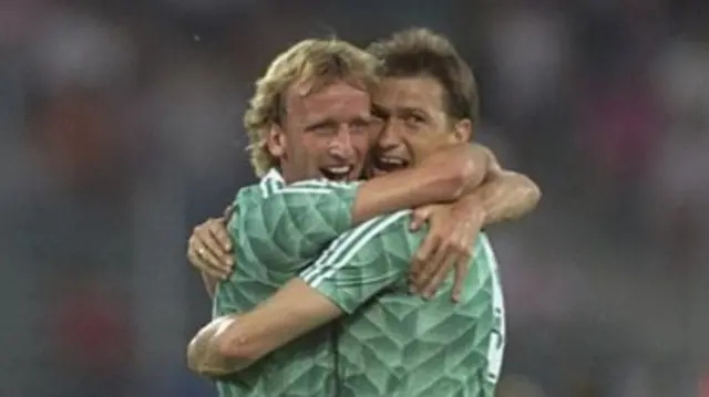 Andreas Brehme (left) and Klaus Augenthaler embrace