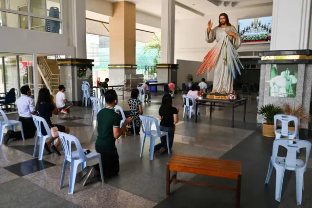 Roman Catholics in Bangkok's Holy Redeemer Church