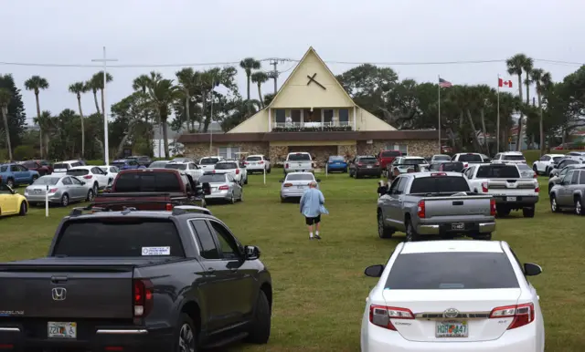 Daytona Beach Drive-in Christian Church in Florida sees worshippers follow the service from their car