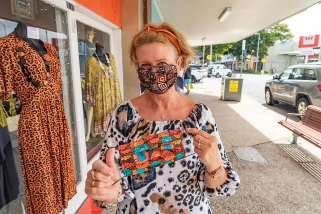 Woman in handmade mask, Queensland