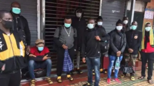 Africans wearing face masks in China