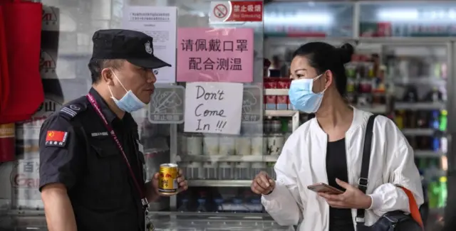 Chinese shop with sign saying 'Don't come in!'