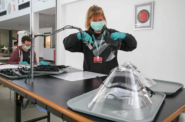 Royal Mint employees making face shields