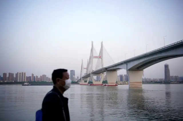 A man wears a mask in Wuhan