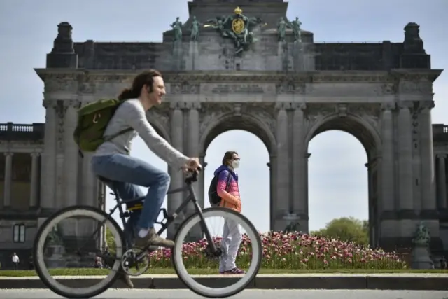 A person rides a bike in Brussels