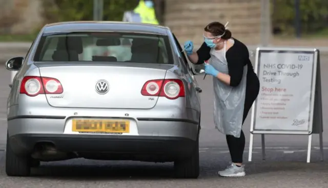 A test being carried out at a drive-through test facility