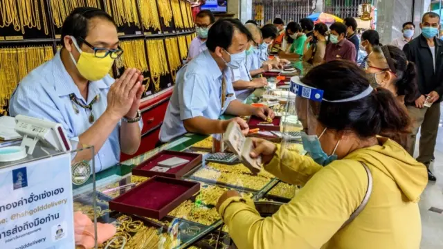 Woman selling gold