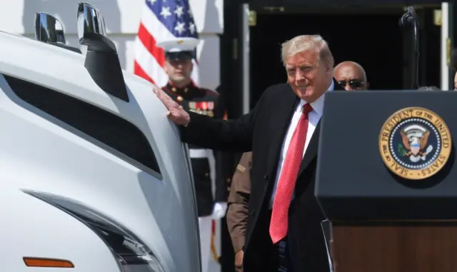 Trump patted a truck parked on the White House lawn