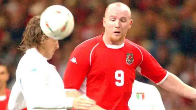 John Hartson makes his presence felt around Massimo Ambrosini