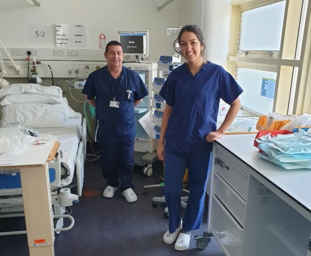 Two nurses wearing clogs