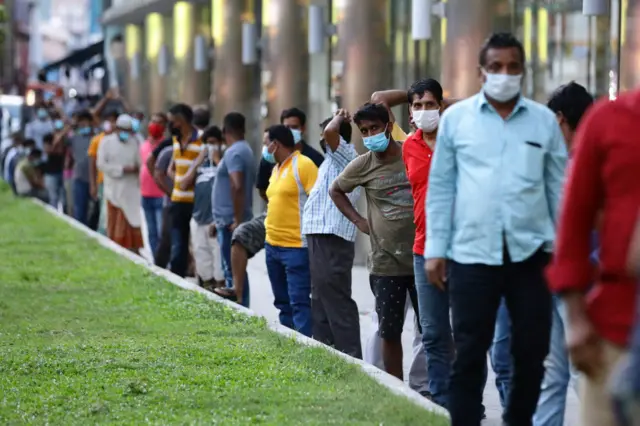 Foreign workers wearing protective masks