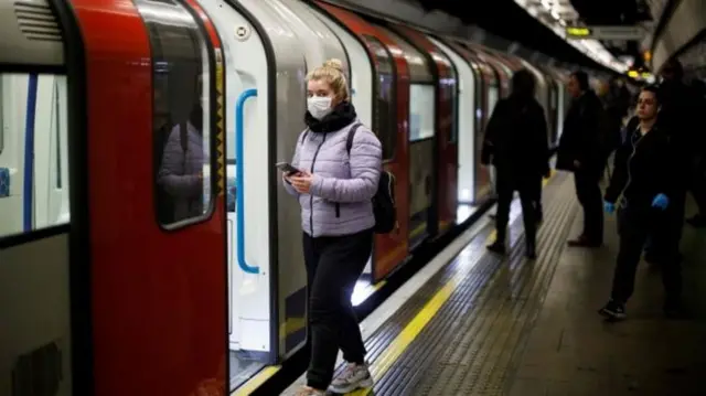 commuter with face mask