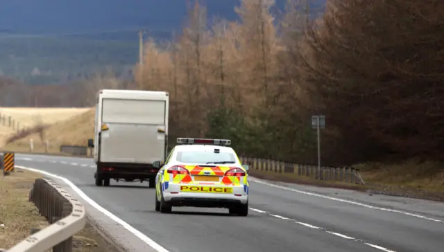 Police Scotland vehicle following van