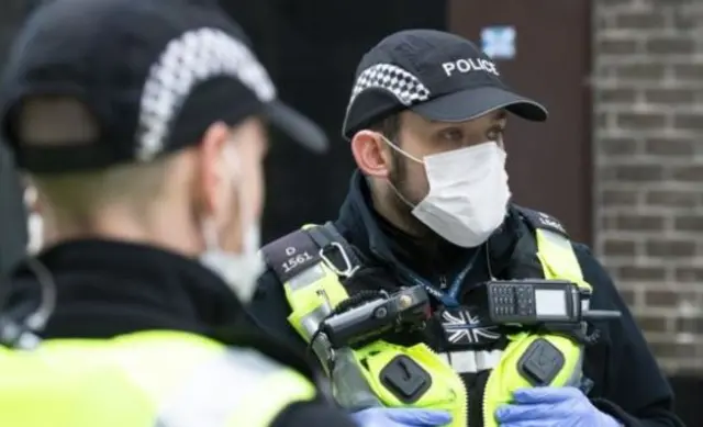 Police wearing masks