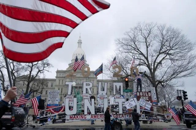 Supporters of the Michigan Conservative Coalition protest against the state's extended stay-at-home order, amid the spread of the coronavirus disease, at the Capitol building in Lansing, Michigan, 15 April 2020.