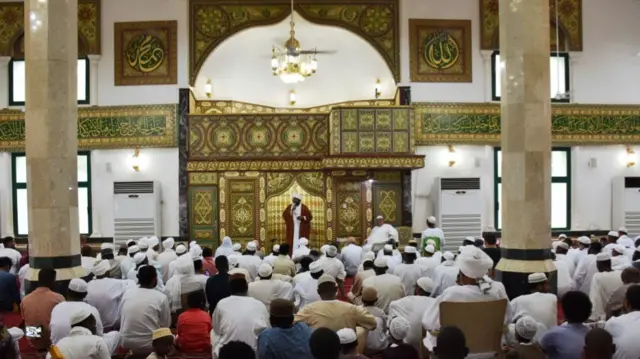 Muslims gather at Sayeda Sanhori Mosque in Khartum, Sudan.