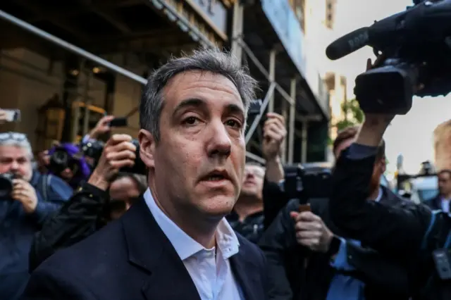 Michael Cohen, U.S. President Donald Trump"s former lawyer, leaves his apartment to report to prison in Manhattan,