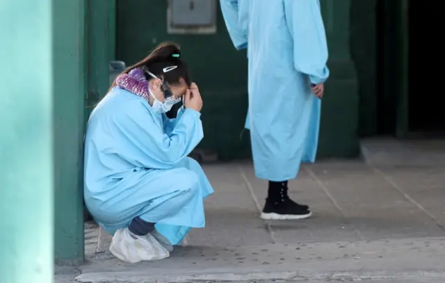 A health worker rests in Buenos Aires, Argentina