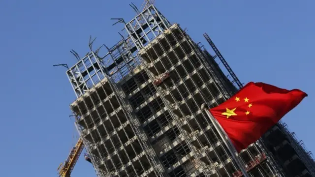 Construction site with Chinese flag