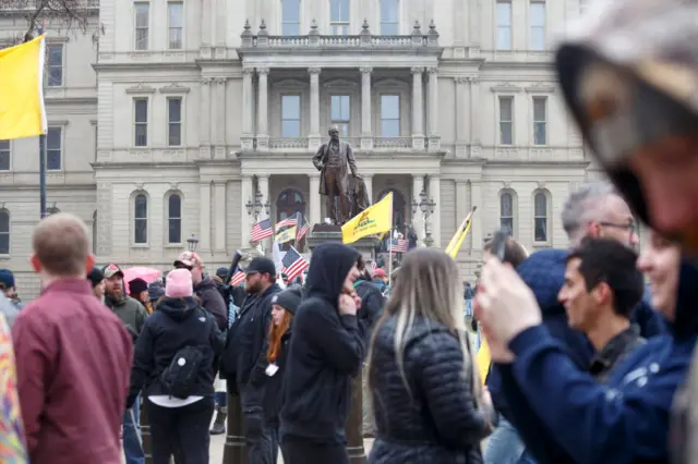 Protesters gathering outside a government building in Michigan