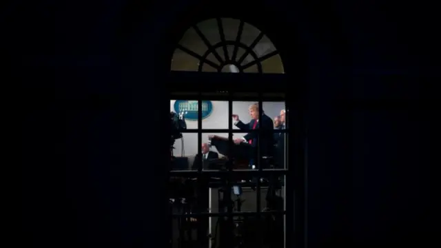 Trump, seen through the White House windows