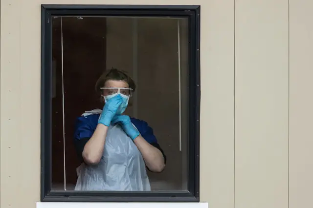 Nurse behind a window