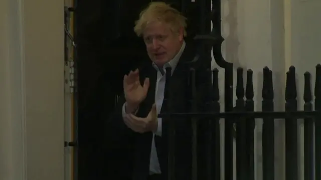 Boris Johnson joined in the applause outside Number 10 Downing Street