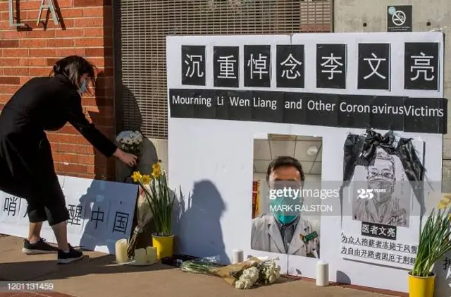 Chinese students and their supporters hold a memorial for Dr Li Wenliang