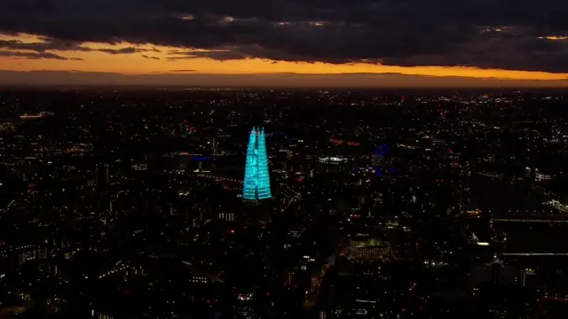 London's Shard tower lights up