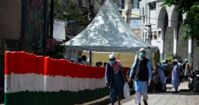 People leaving the Tablighi Jamaat headquarters in Delhi