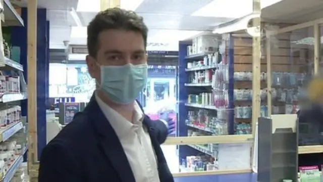 Pharmacist in a face mask