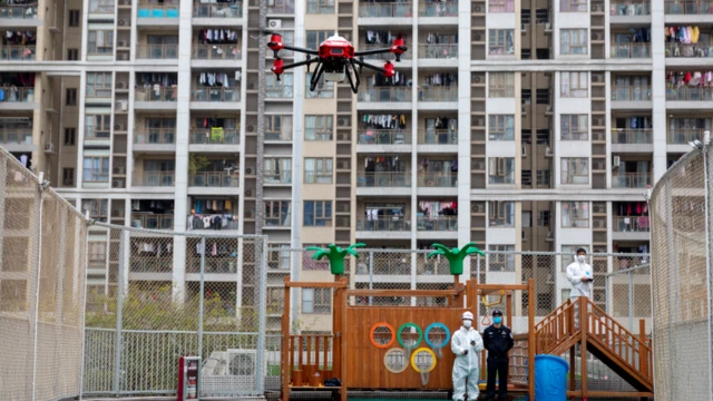 Flying a drone over a childrens' park