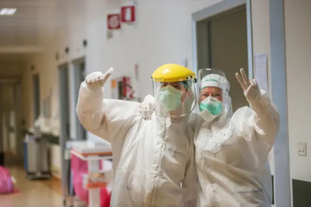 Medical staff give thumbs up inside the Covid-19 ward in the Bellaria Hospital in Bologna, Italy.