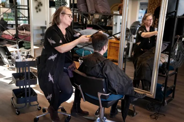 A hairdresser reopens in Denmark, 20 April 2020