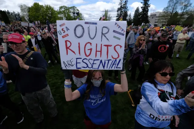 protesters demonstrate outside the state Capitol in Olympia, Washington