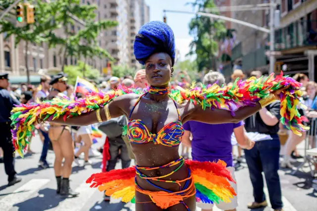 A woman takes part in the 2019 WorldPride NYC March