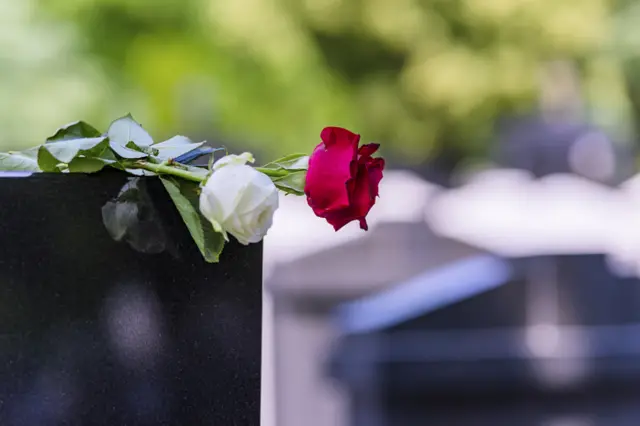 Rose on headstone