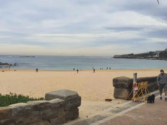 People on the sand at Coogee Beach