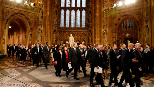 MPs travel through the Central Lobby at the Houses of Parliament