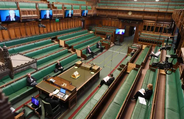 A photograph released by the UK Parliament shows a chamber rehearsal ahead of the return of MPs to Parliament during the coronavirus lockdown in the House of Commons