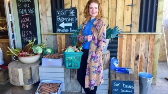 Sophie Coffey outside a farm shop