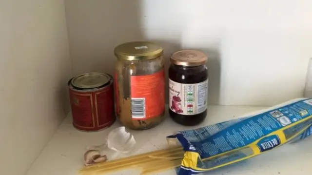 Jars in a cupboard