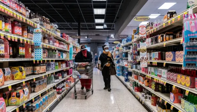 Shoppers browse in a supermarket