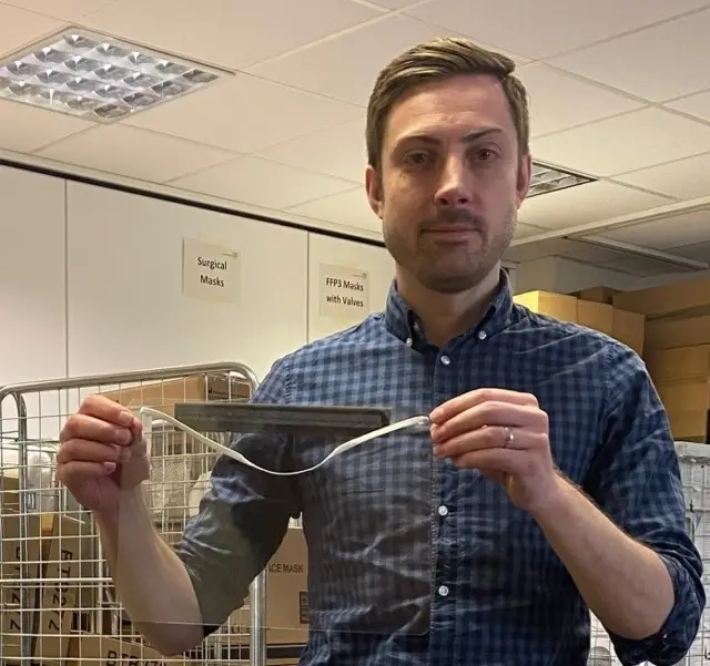 Russell Hadfield, LPT’s Clinical Category Manager, holding one of the visors