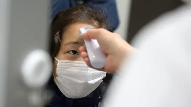 Japanese child wearing a face mask