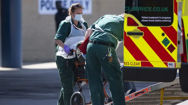 Paramedic wearing PPE