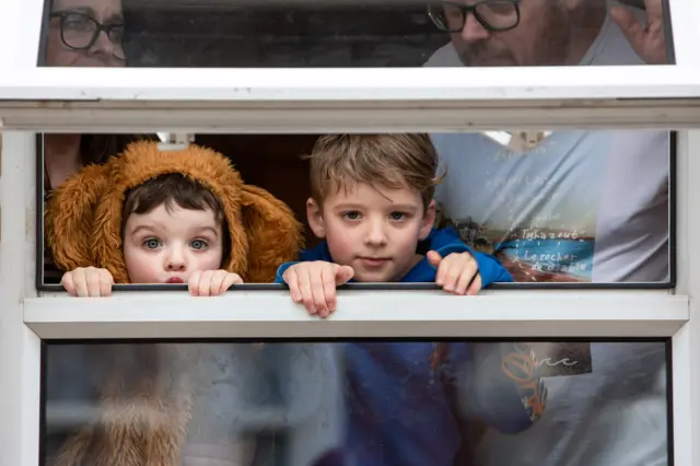 Family in a window